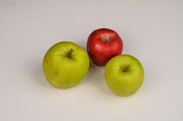 Ripe green and red apples on white background. Not isolate