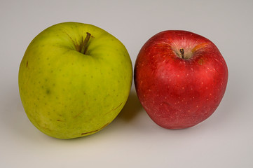 Ripe green and red apples on white background. Not isolate