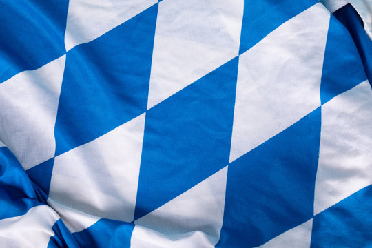 Bavarian Flag As A Background For Oktoberfest. © vegefox.com