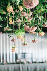flower chandelier at wedding, flowers hanging from ceiling 