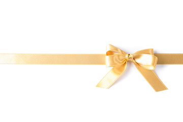 Golden ribbon with bow isolated on white background. Gift concept