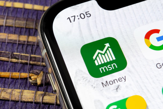 Sankt-Petersburg, Russia, December 5, 2018: Microsoft MSN money application icon on Apple iPhone X smartphone screen close-up. Microsoft msn money app icon. Social network. Social media icon