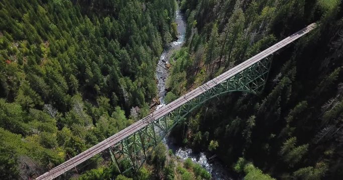 Bird Eye View Aerial Of Abandoned Vance Creek Bridge And Deep Canyon Between Satsop Hills, Washington State Usa
