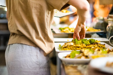 Woman prepare food in a restaurant