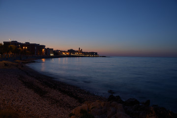 View of city of Giovinazzo at sunset