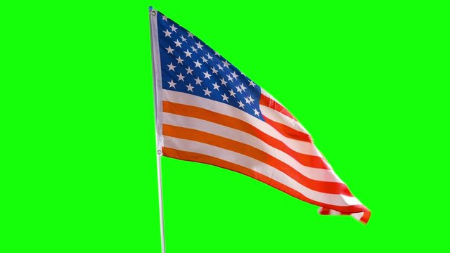 American flag waving in the studio with green screen background. Shot in 4k resolution