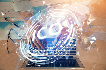 Blockchain theme hud with man working on computer on background. Concept of crypto chain. Double exposure.