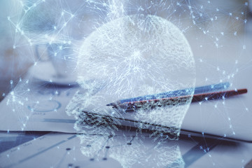 Double exposure of desktop with computer and brain drawing hologram. Artificial intelligence...