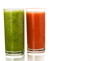 Fresh cocktail on isolate. Two glasses with vegetable cocktails. Healthy drinks.