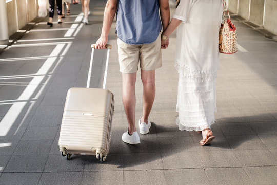 Young asian traveler couple with suitcase ready to flight for honeymoon, vacation and travel concept