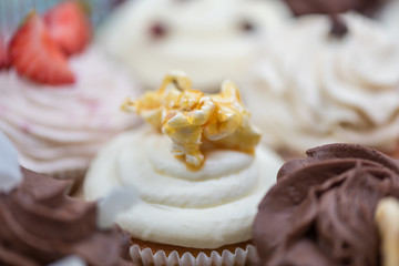 Sweet delicious colorful cupcakes for celebration