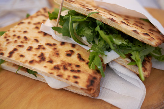Piadina romagnola with rocket and cheese
