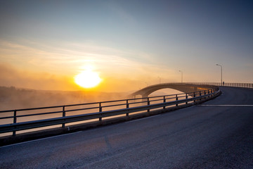 Fototapeta na wymiar Sunset on Brønnøysund bridge in Norhern Norway