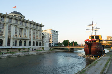 Boat and Restaurant. Sunset In central Skopje this mock galleon ship sits atop the Vardar river in...