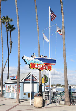 NEWPORT BEACH, CALIFORNIA - JANUARY 6, 2017: U-Drive Boat Sign. The boat rental facility in on the Balboa Peninsula in the Fun Zone area.