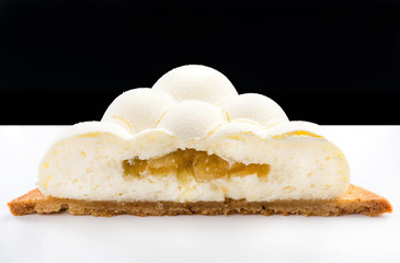 Artisan Monoportion Patisserie Dessert Cake on Black Reflective Background