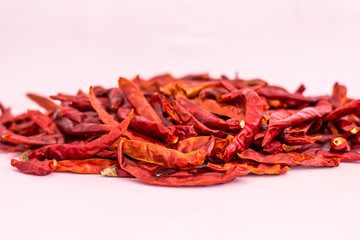 Dried red chili or chilli cayenne pepper isolated on white background