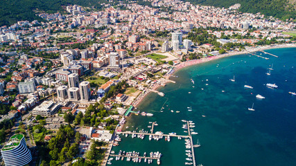 Fototapeta premium Top view of Old town in Budva in a beautiful summer day, Montenegro. Aerial image.