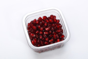 Pomegranet seeds in the plastic box