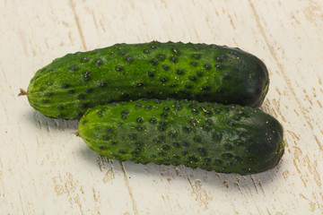 Ripe fresh green two cucumbers