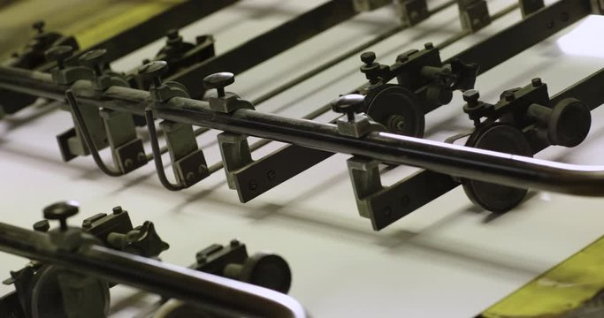 Footage of the machine work in printing house.