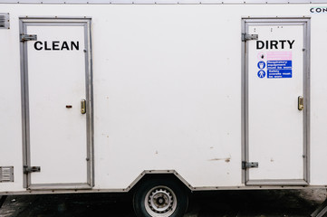 Asbestos clean-up: clean and dirty portable shower unit