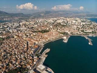 Fototapeta premium Split, Croatia, august 2019: Aerial view of Split city, Diocletian Palace and Mosor mountains in background. Split panoramic view of town, UNESCO World Heritage
