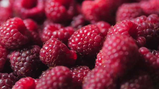 Close Up Berry. Fresh, Juicy Raspberry Background, Ripe. Macro Red Raspberries Fruit. Fresh Raspberry Fruits As Food Dackground. Healthy Food Organic Nutrition.