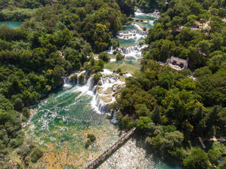Aerial view of waterfalls in Krka National Park, one of the most famous national parks and visited by many tourists.Skradinski Buk:KRKA NATIONAL PARK,CROATIA, August 2019