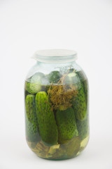Glass can with canned cucumbers