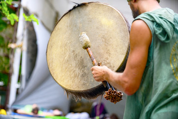 Shaman plays a tambourine, Ukraine. Odessa, August 2019