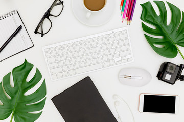 Creative flat lay photo of modern workplace with laptop, top view laptop background and copy space on white background, Above view shot of Computers on white background