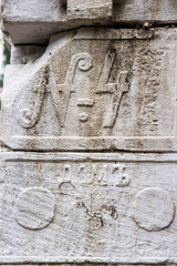 stone carving. Inscription in russian house number four.