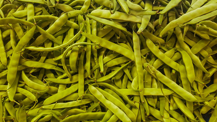 fresh green french beans at the vegetable store stand