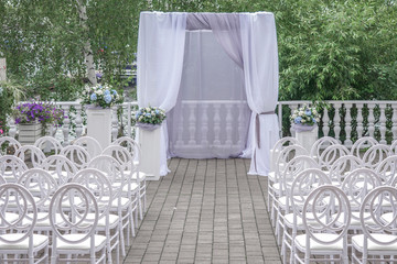 Wedding arch and chairs