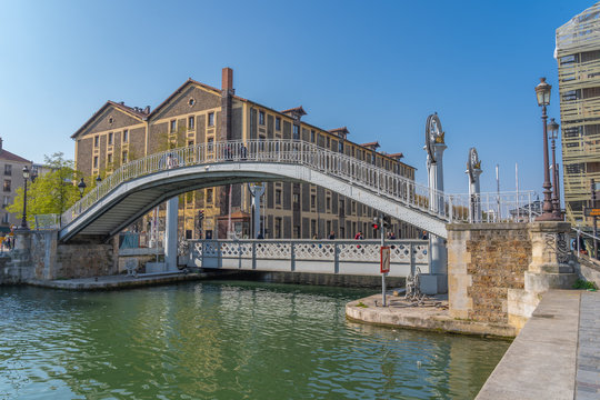 Paris, France - 04 14 2019: Canal Lourcq. Bridge of Flanders