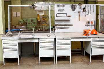 Old mechanical workshop - workbench with stand for hand tools