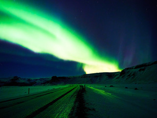 Naklejka na ściany i meble Powerful aurora borealis in the sky