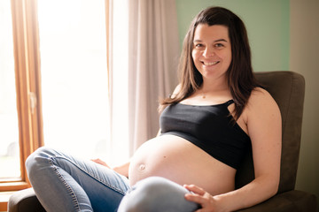 A Beautiful Pregnant mother on baby room