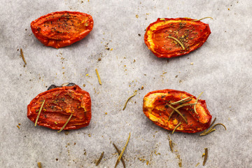 Sun dried tomatoes on light background