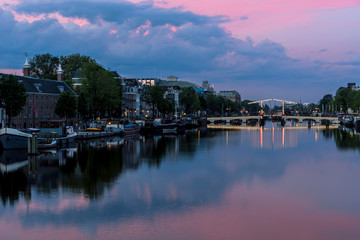 Fototapeta na wymiar Amsterdam Canal Purple Sky