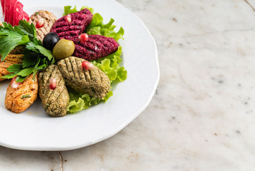 Phali - a traditional Georgian snack with vegetables and nuts top view