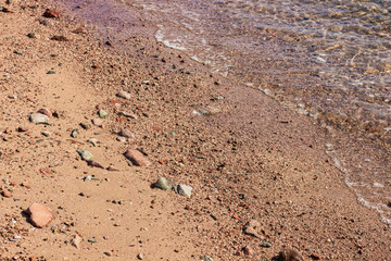 sand stone wild beach waterfront scenic landscape shoreline natural background with water