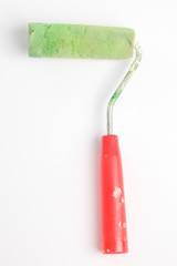 Paint roller in front of a white background