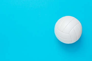 Volleyball leather ball on a blue background. Copy space