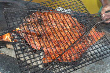 Delicious grilled fish Acapulco’s Style. Traditional Mexican barbecued fish called “Pescado a la Talla”