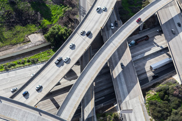 Aerial view of Interstate 5 and Route 118 freeway interchange ramps in the San Fernando Valley area of Los Angeles, California.
