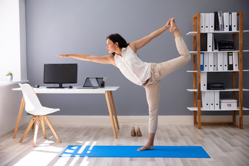 Businesswoman Doing Stretching Exercise