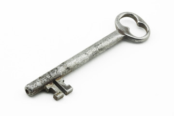 Antique vintage key macro on white background