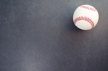 baseball on a dark surface - objects still life